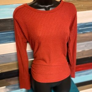 Rust colored long sleeve knit pullover